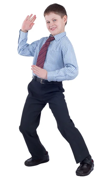 Joven colegial en uniforme escolar mostrando karate — Foto de Stock