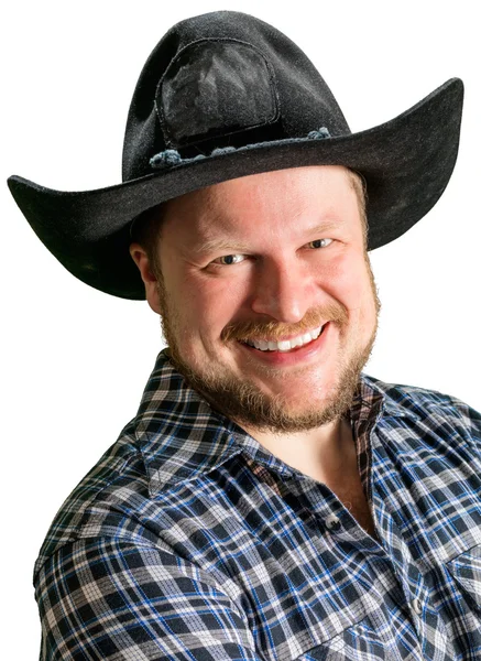 Cowboy pria di kemeja kotak-kotak dengan topi hitam — Stok Foto