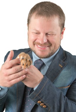 Adam holding hamster kolundaki