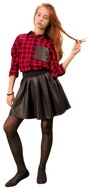 Menina adolescente bonita em vestido vermelho e preto de pé — Fotografia de Stock