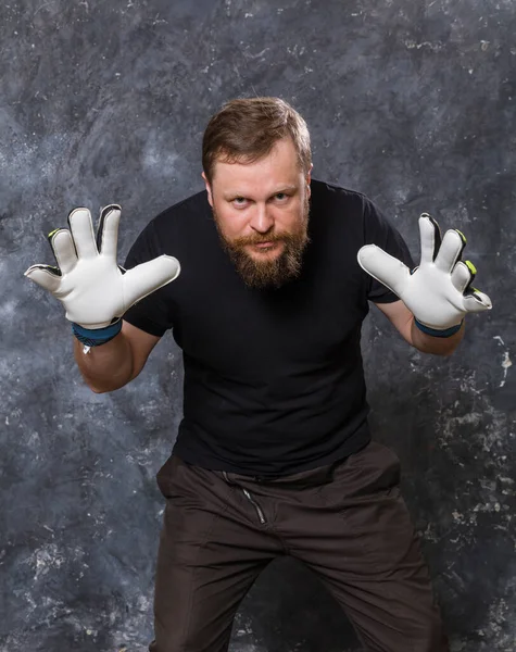 Matured bearded sportsman football goalkeeper studio portrait. — Stock Photo, Image