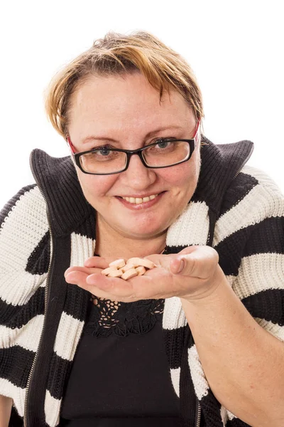 Middle aged housewife offers the tablets studio emotional portrait — Stock Photo, Image