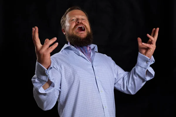 Solid bearded man in shirt singing opera