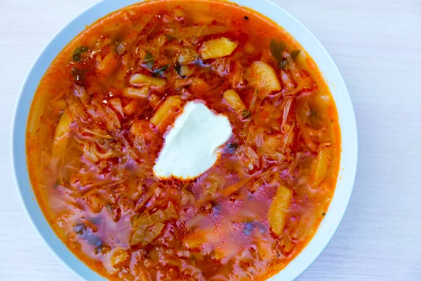 Served tasty cabbage soup meal close up view. — Stock Photo, Image