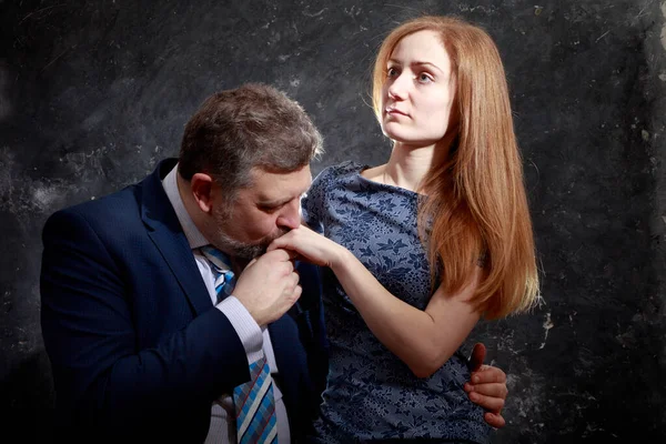 Bearded man and young woman, happy couple studio portrait — Stock Photo, Image