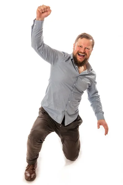 Joyful bearded man in shirt is happy to win — Stock Photo, Image