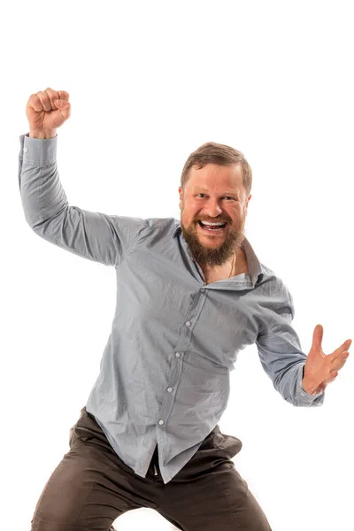 Vreugdevolle man met baard in hemd is blij om te winnen — Stockfoto