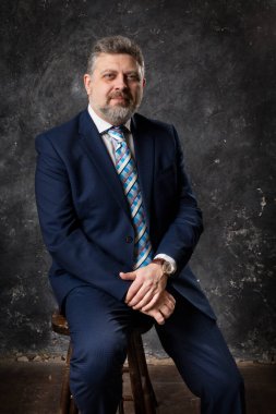Mature businessman studio portrait