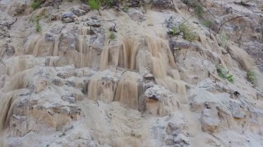 Kumlu deniz plaj doğal zemin üzerine kum akışı