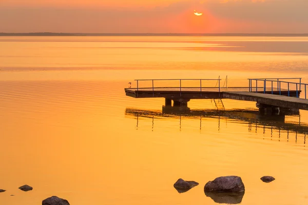 Sunset over water — Stock Photo, Image