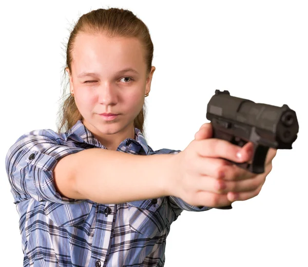 Teen girl aiming from the gun — Stock Photo, Image