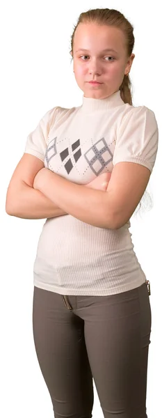 Dospívající dívka stojí kříž ruce izolovaných na bílém pozadí — Stock fotografie