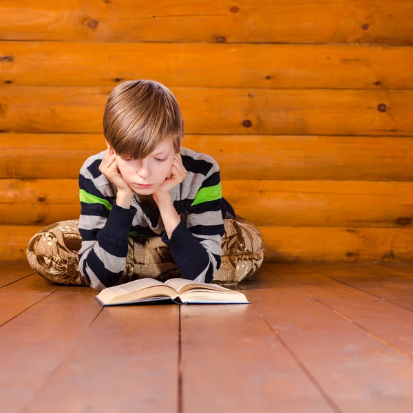 Teenboy reading book — Stock Photo, Image