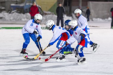 RUSSIA, ARKHANGELSK - DECEMBER 14, 2014: 1-st stage childrens hockey League bandy, Russia