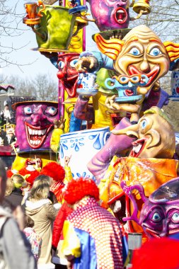 OLDENZAAL, NETHERLANDS - MARCH 6, 2011: People in colourful carnival dress during the annual carnival parade  in Oldenzaal, Netherlands.