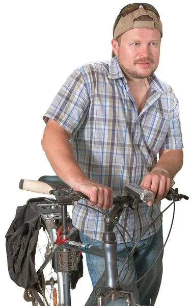 Beyaz zemin üzerinde bir bisiklet ile ayakta turist adam — Stok fotoğraf