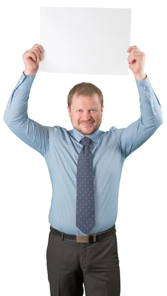 Бизнесмен средних лет, стоящий с пустым списком бумаги на белом фоне — стоковое фото