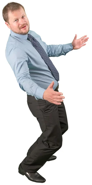 Middle-aged businessman moving on white background — Stock Photo, Image