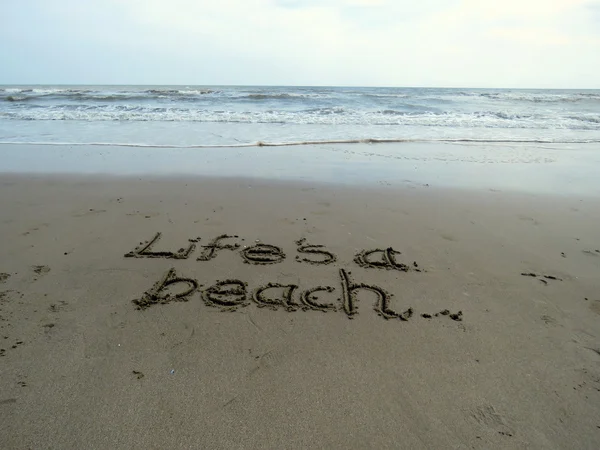 Lifes a Beach written in sand — Stock Photo, Image