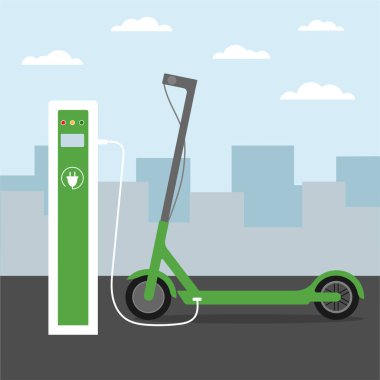 Elektrikli scooter şarj istasyonunda. Şehir arkaplanı. 