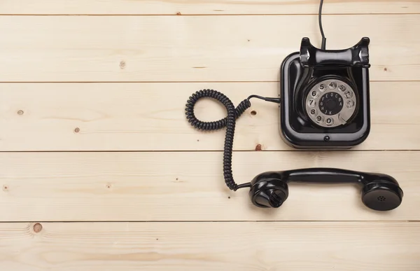 Velho retro telefone preto — Fotografia de Stock