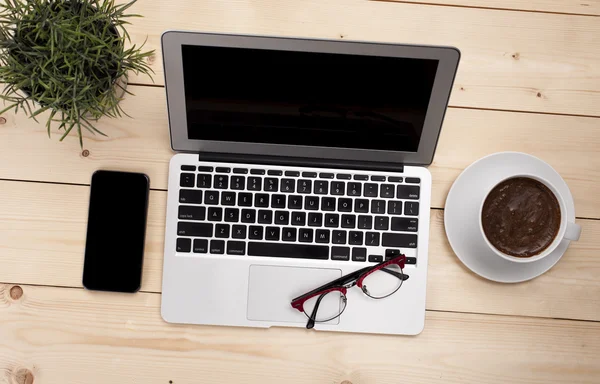 Laptop computer, phone and coffee — Stock Photo, Image