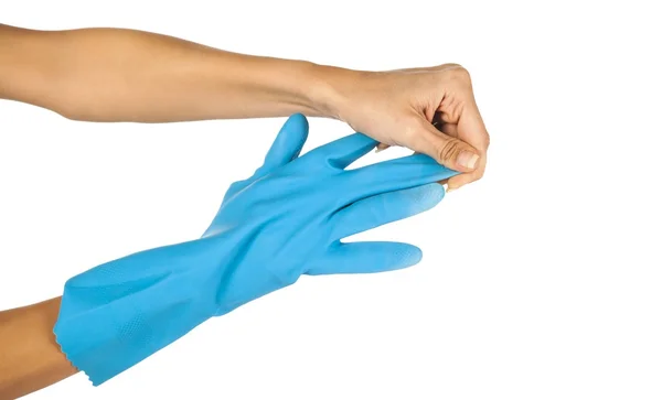 Rukou a modré gumové rukavice — Stock fotografie