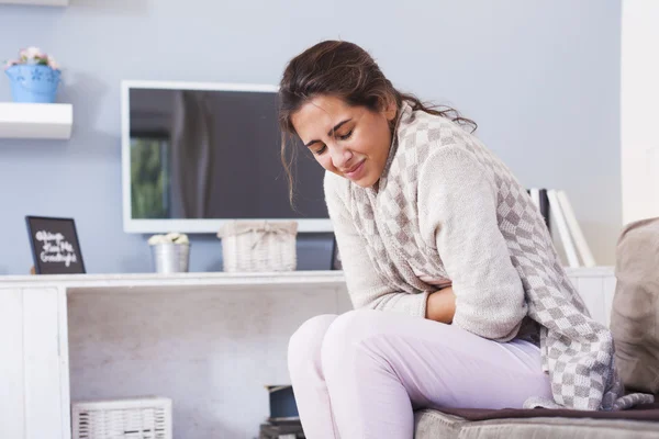 Woman with hard stomach pain — Stock Photo, Image