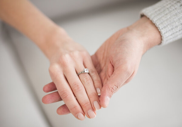 hands with wedding ring