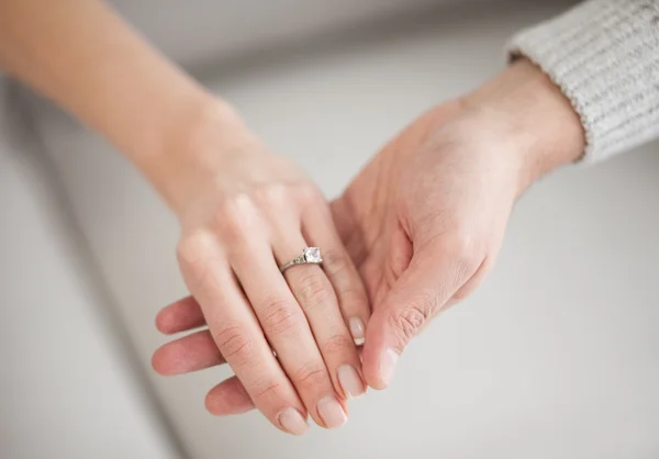 Hands with wedding ring Stock Picture