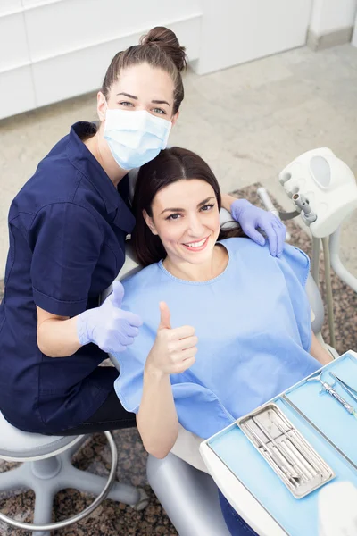 At the dentist. Female dentist in action — Stock Photo, Image