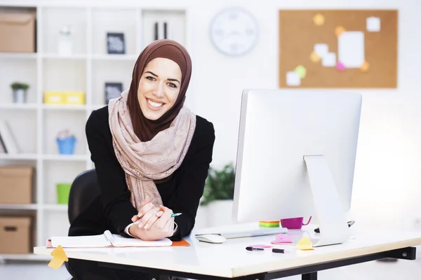 Arabian business woman in office