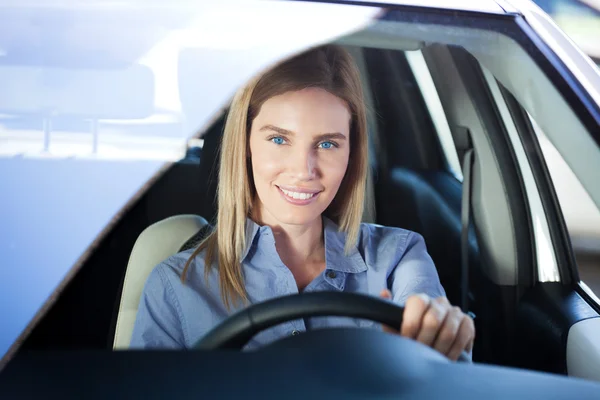 Blonde woman in car Stock Photo