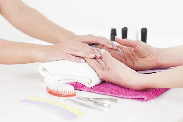 Woman receiving manicure — Stock Photo, Image
