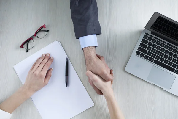 Businessman and businesswoman hands holding — Stock Photo, Image