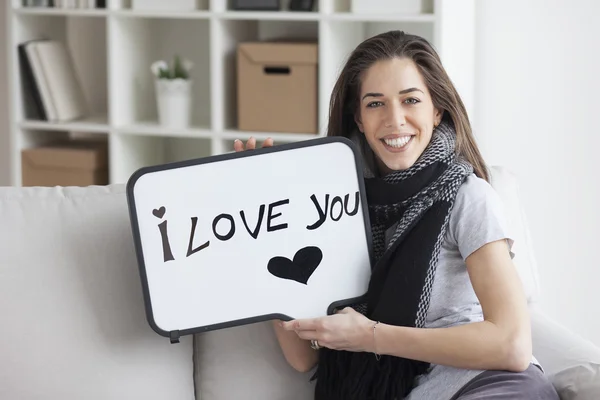 Woman holding board with I love you — Stock Photo, Image