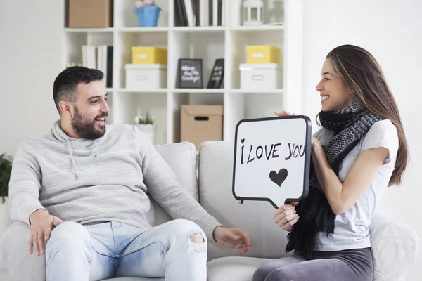 Couple showing love message — Stock Photo, Image