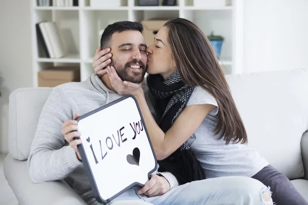 Young couple showing love message — Stock Photo, Image