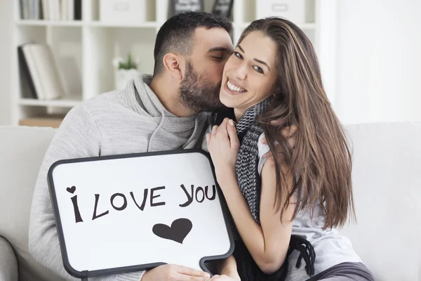 Couple showing love message — Stock Photo, Image