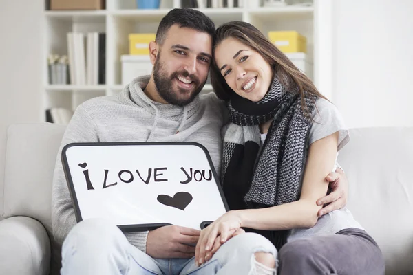 Couple showing love message — Stock Photo, Image