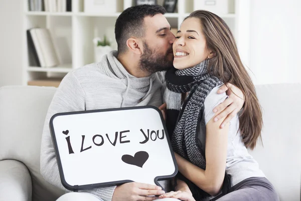 Couple showing love message — Stock Photo, Image