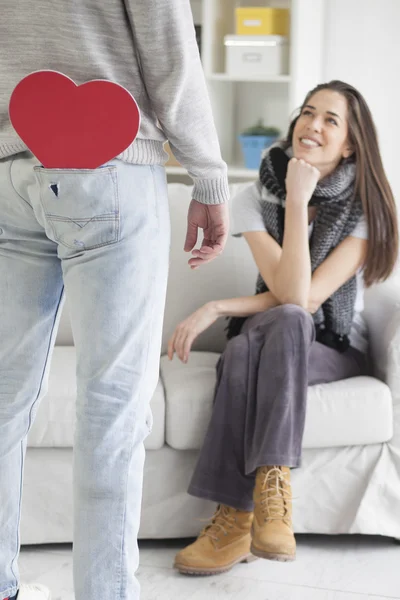 Man with heart ready to give to girlfriend — Stock Photo, Image