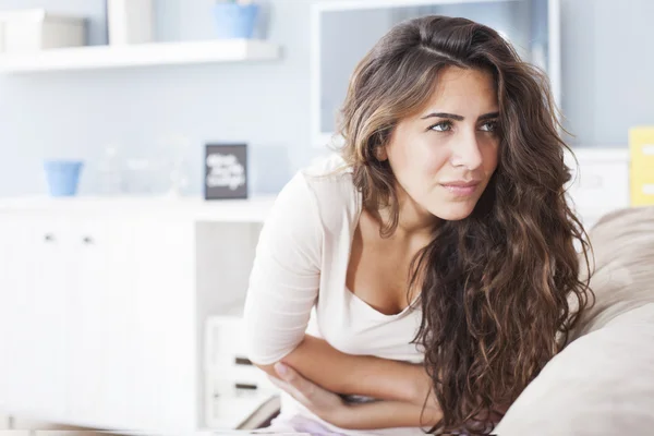 Woman with hard stomach pain — Stock Photo, Image