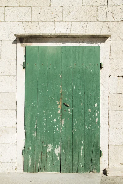 Old vintage green door
