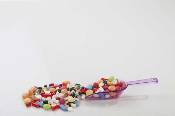 Many colorful pills — Stock Photo, Image