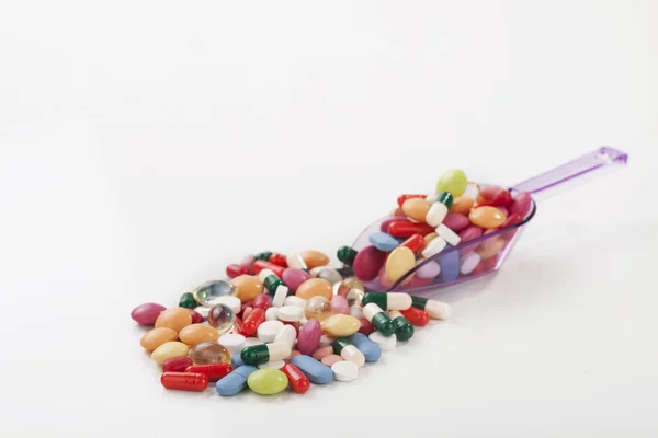 Many colorful pills — Stock Photo, Image