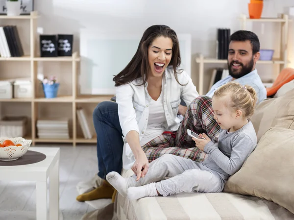 Young  family relaxing — Stock Photo, Image