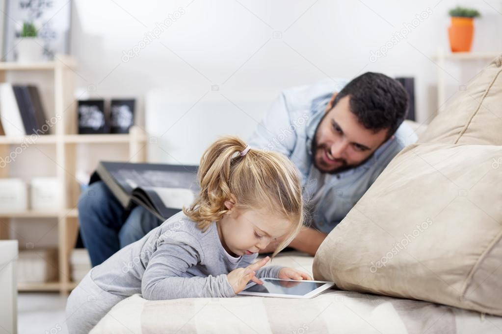 Dad and daughter in living room