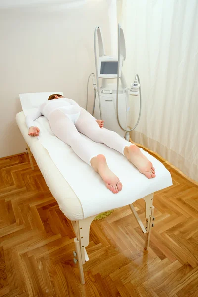 Woman having a treatment against cellulite with LPG machine — Stock Photo, Image