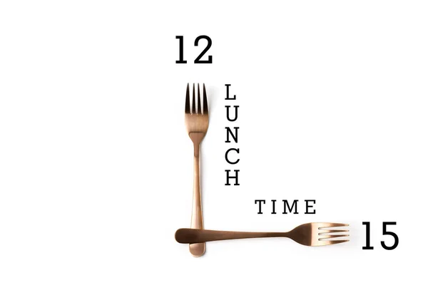 Klocka gjord av två gaffel, isolerad på vit bakgrund — Stockfoto
